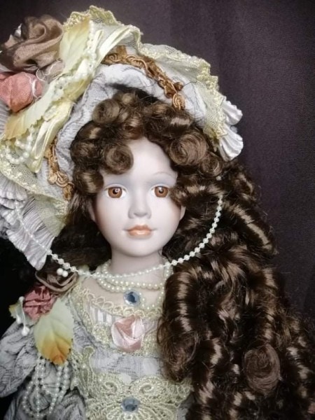 A decorative porcelain doll.