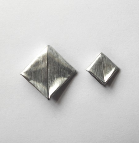 The two sizes of folded squares.