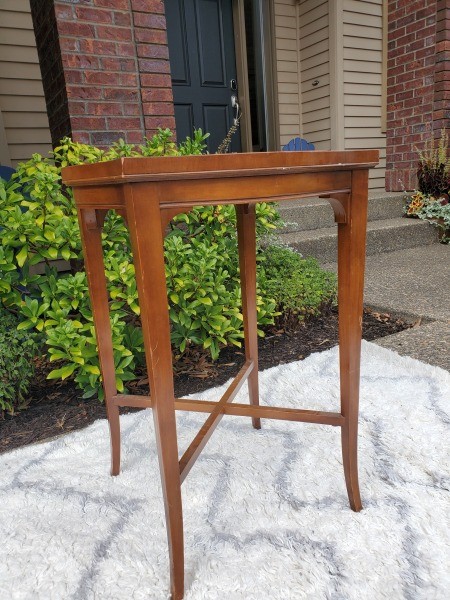 A wooden end table.