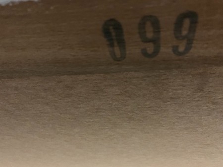A serial number marked inside the dresser.