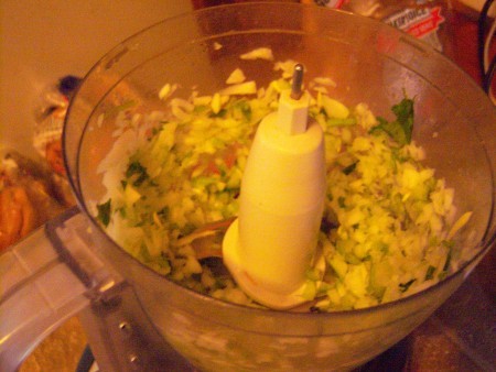 Chopping veggies in a food processor.