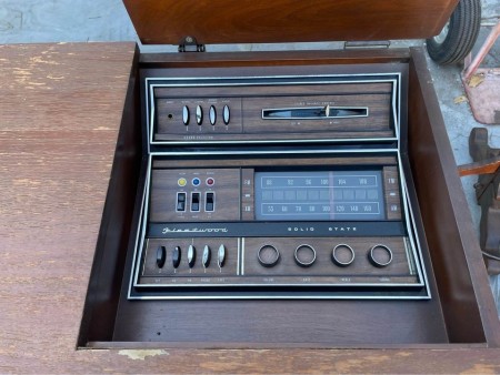 The controls for a console stereo.