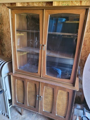A vintage Bassett china cabinet.