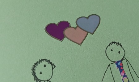 Heart stickers on a card.