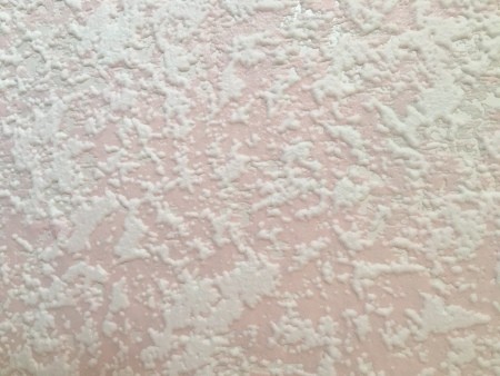 Pink and white wallpaper.