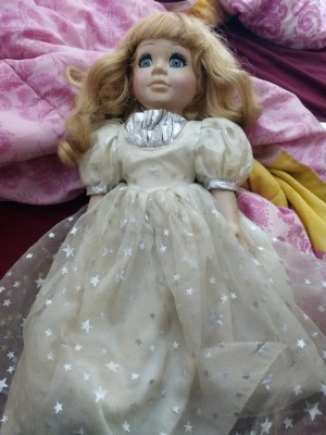 A doll with a starry skirt.