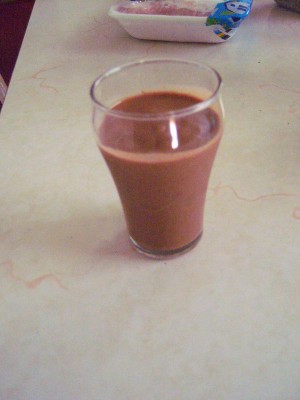 A glass of chocolate shake.