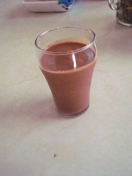 A glass of chocolate shake.