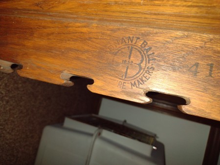 The Conant Ball marking on a piece of furniture.