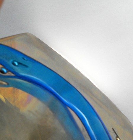 Melting the edges of the plastic.