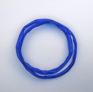 Two plastic bangles.