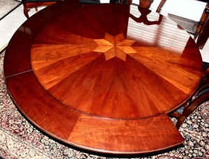 A wooden perimeter leaf table.