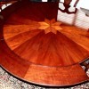 A wooden perimeter leaf table.
