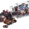 A glass jar full of buttons.