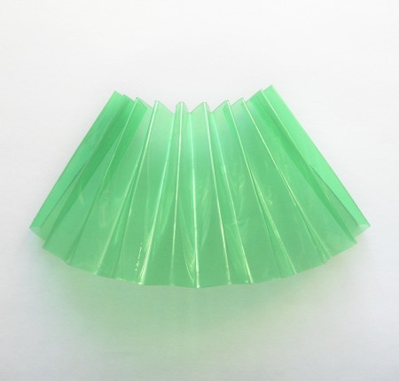 Making an accordion fold from the plastic.