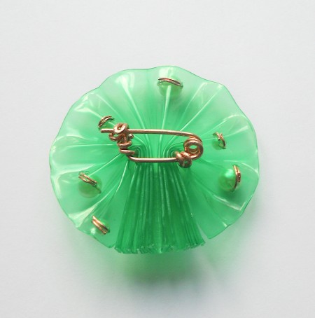 Adding the pin to the back.