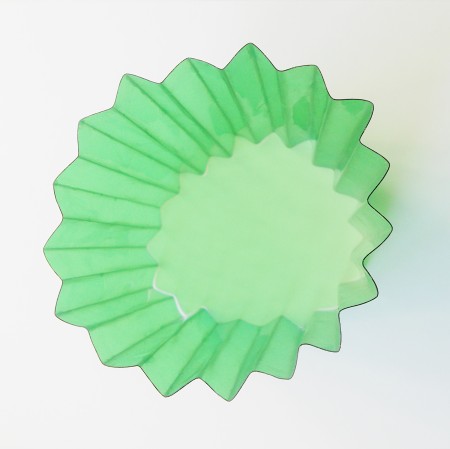 adding accordion folds to the plastic cylinder.