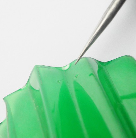 Adding holes through the top of the plastic.