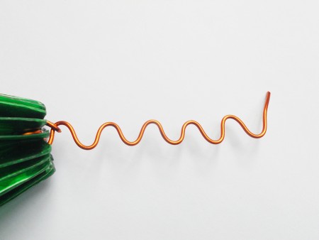 Making a star shape from wire at the top of the tree.