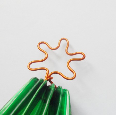 Making a star shape from wire at the top of the tree.