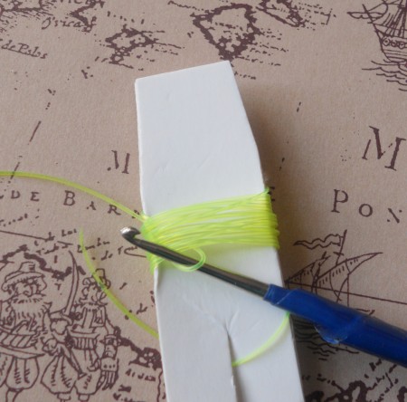 Using a crochet hook on the fishing line.