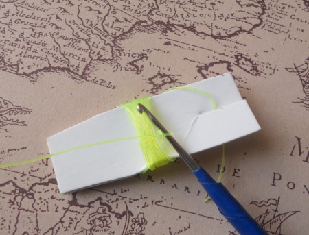 Using a crochet hook on the fishing line.