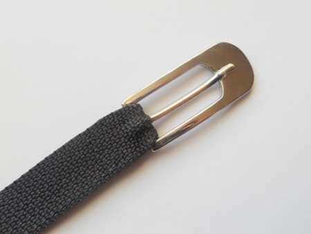 A buckle end from a fabric belt.
