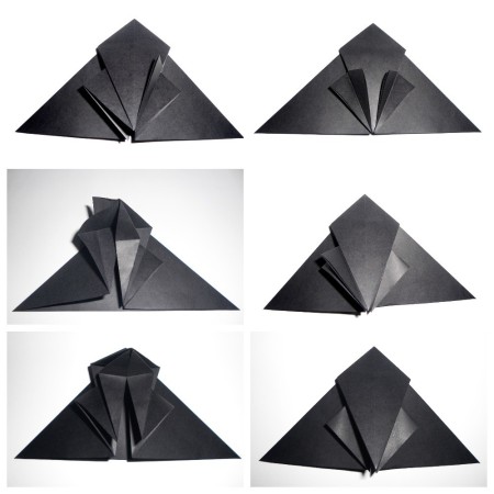 Folding origami bats.