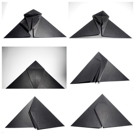 Folding origami bats.