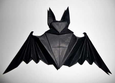 A folded origami bat.