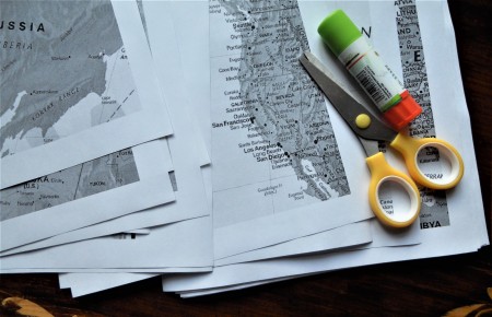 cutting out the map pieces.