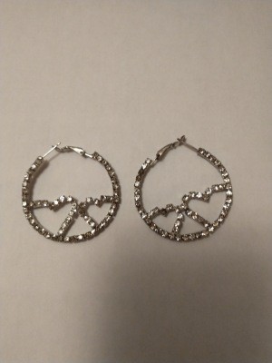 A pair of rhinestone earrings.