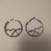 A pair of rhinestone earrings.
