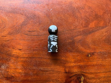 Adding the arms and legs to the peg doll.