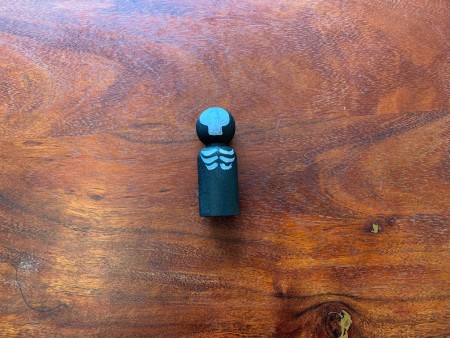 Adding the ribs to the peg doll.