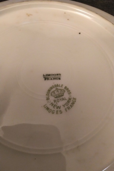 The marking on the back of a Limoges gold plate.