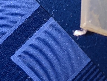 A white fuzz on a blue item.