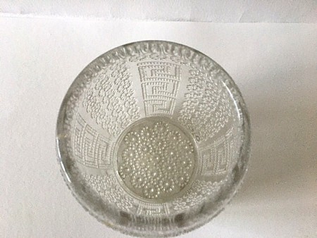 A heavy decorative drinking glass from the top.