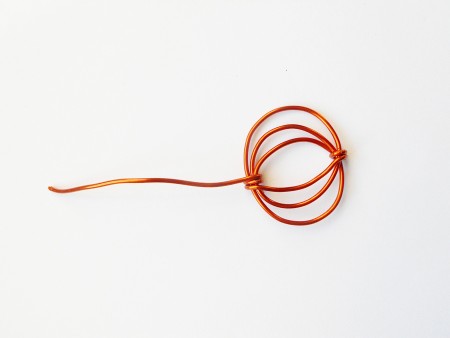 The pumpkin with a long wire stem.