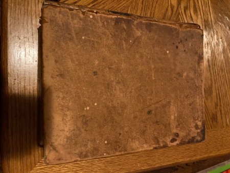 The cover of an old dictionary.