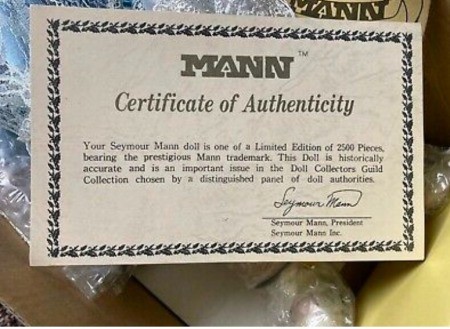 The certificate of authentication for a porcelain doll.