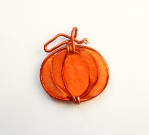 The finished pumpkin pendant.