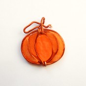 The finished pumpkin pendant.