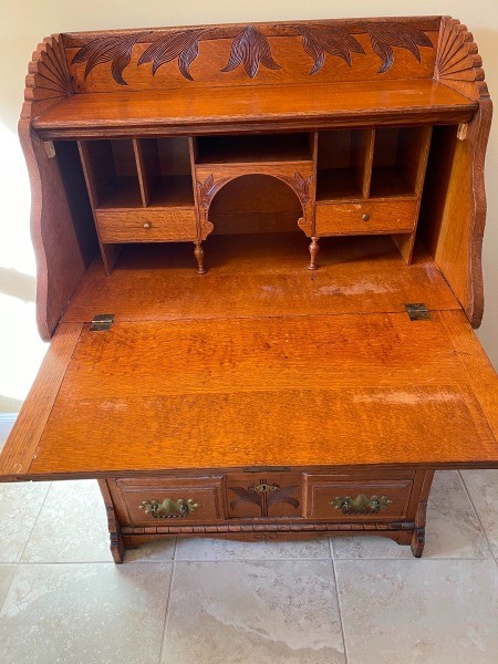 An open wooden desk.