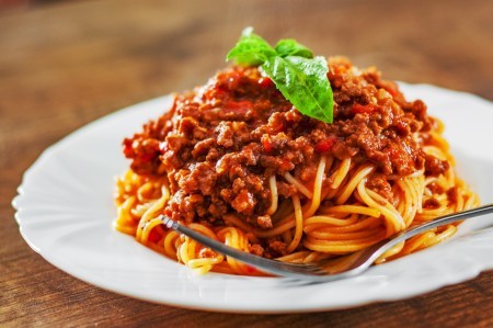A plate of spaghetti with meat sauce.