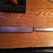 A vintage silver butter knife.