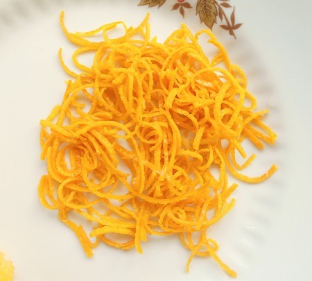 The cooked orange peel.