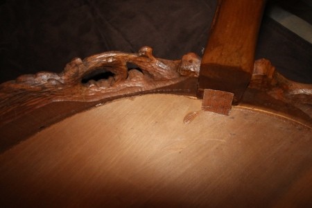 The underside of a wooden coffee table.