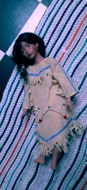 A porcelain Indian doll.