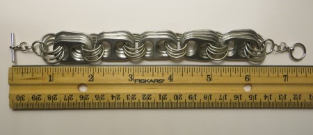 Measuring the completed bracelet.